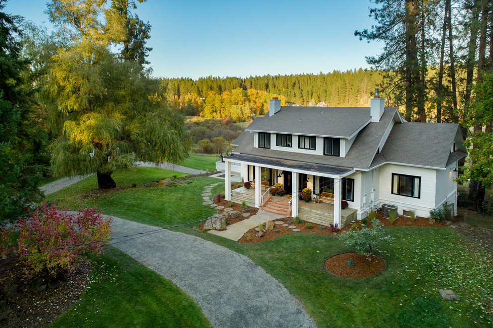 Farmhouse home design photo in Seattle