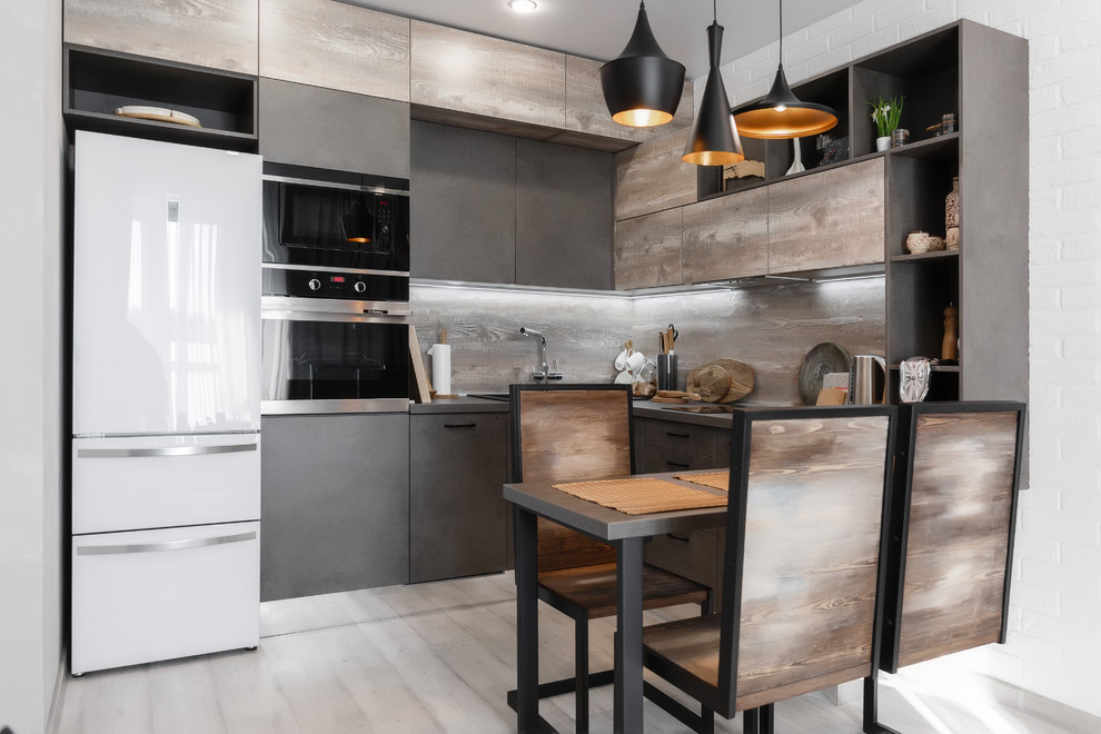 Design ideas for a small industrial u-shaped separate kitchen in Moscow with an undermount sink, flat-panel cabinets, medium wood cabinets, wood benchtops, brown splashback, timber splashback, stainless steel appliances, ceramic floors, with island, grey floor and brown benchtop.