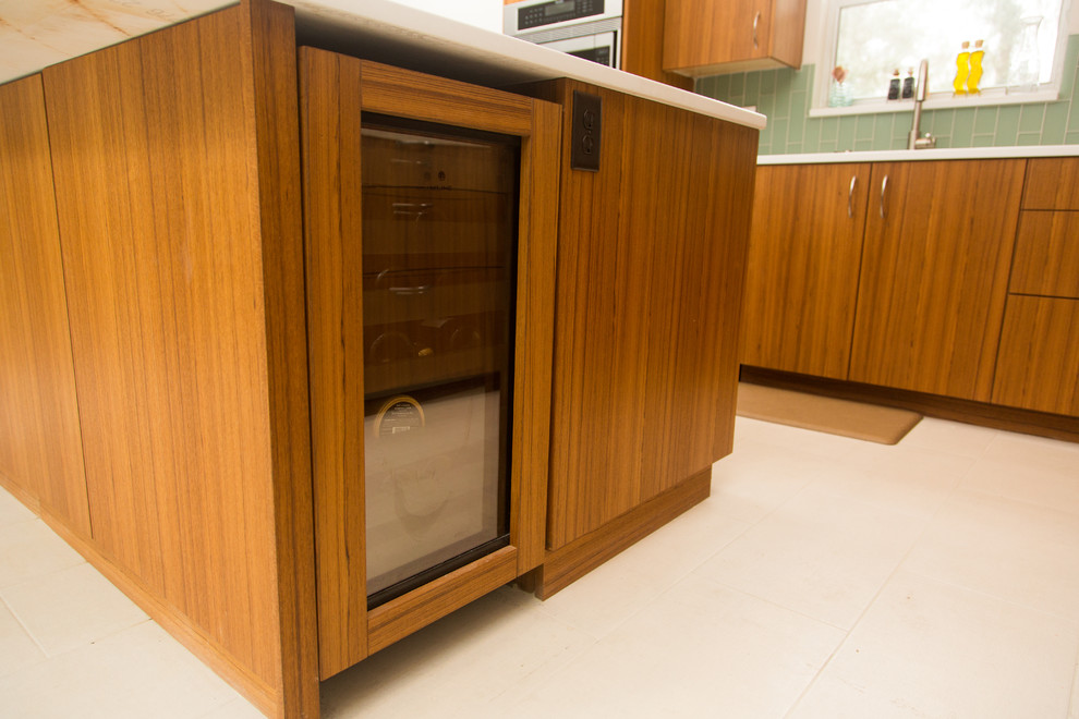 Inspiration for a midcentury l-shaped kitchen in Other with flat-panel cabinets, medium wood cabinets and with island.
