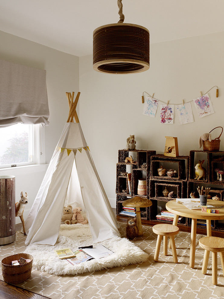 Design ideas for a country gender-neutral kids' room in San Francisco with beige walls and dark hardwood floors.