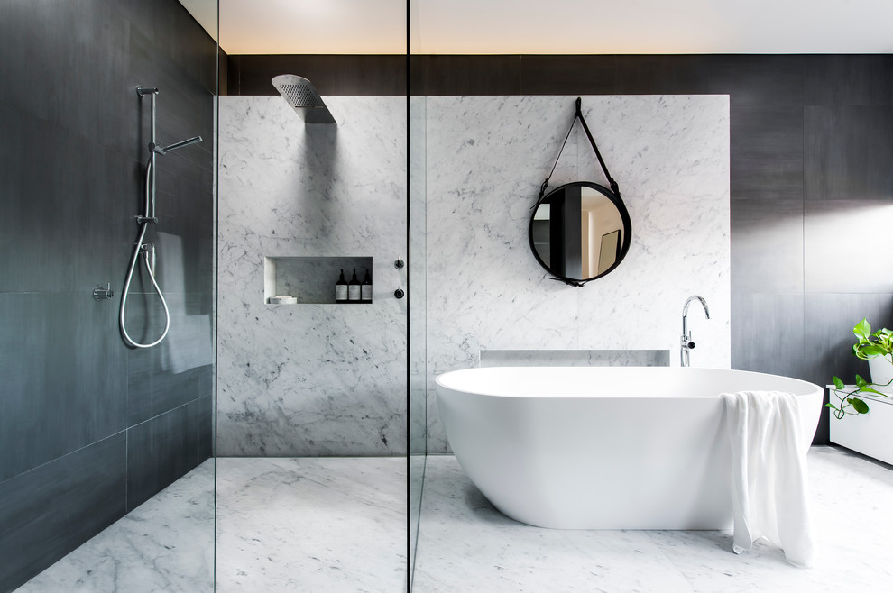 Design ideas for a large contemporary master bathroom in Sydney with a freestanding tub, an open shower, gray tile, grey walls, ceramic floors, an open shower and marble.