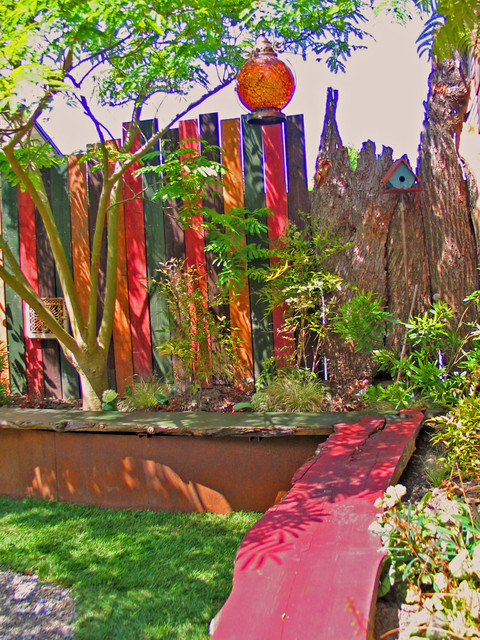 Inspiration for an eclectic shade backyard landscaping in Seattle.