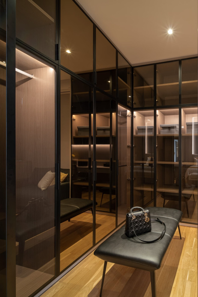 Design ideas for a contemporary storage and wardrobe in Singapore.