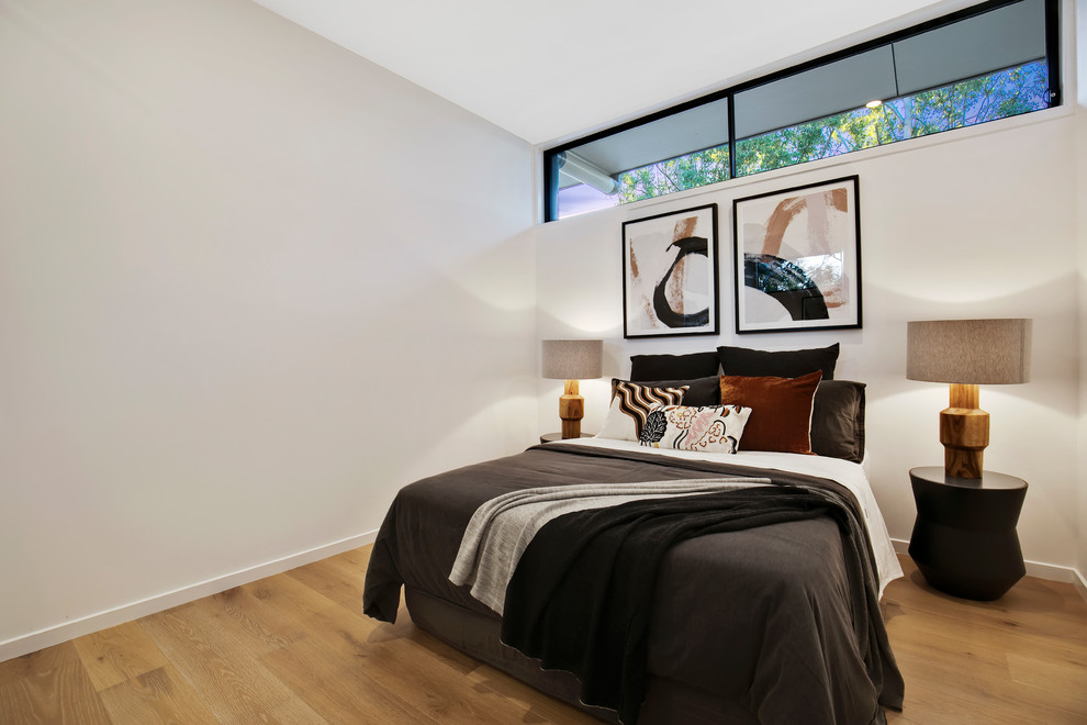 Photo of a contemporary bedroom in Sunshine Coast.