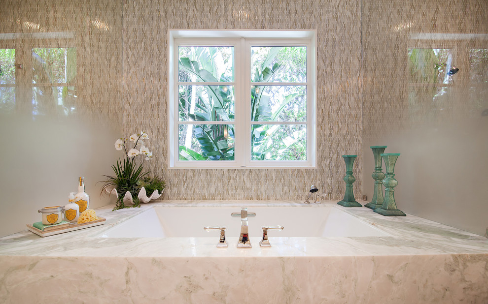 Huge transitional master white tile and stone slab marble floor alcove bathtub photo in Miami with flat-panel cabinets, white cabinets, an undermount sink and marble countertops