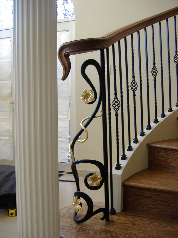 Staircase - mid-sized traditional wooden floating mixed material railing staircase idea in DC Metro with wooden risers