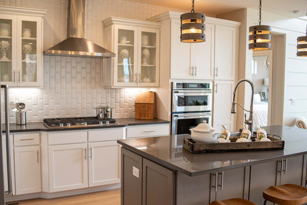 Example of a transitional kitchen design in Denver