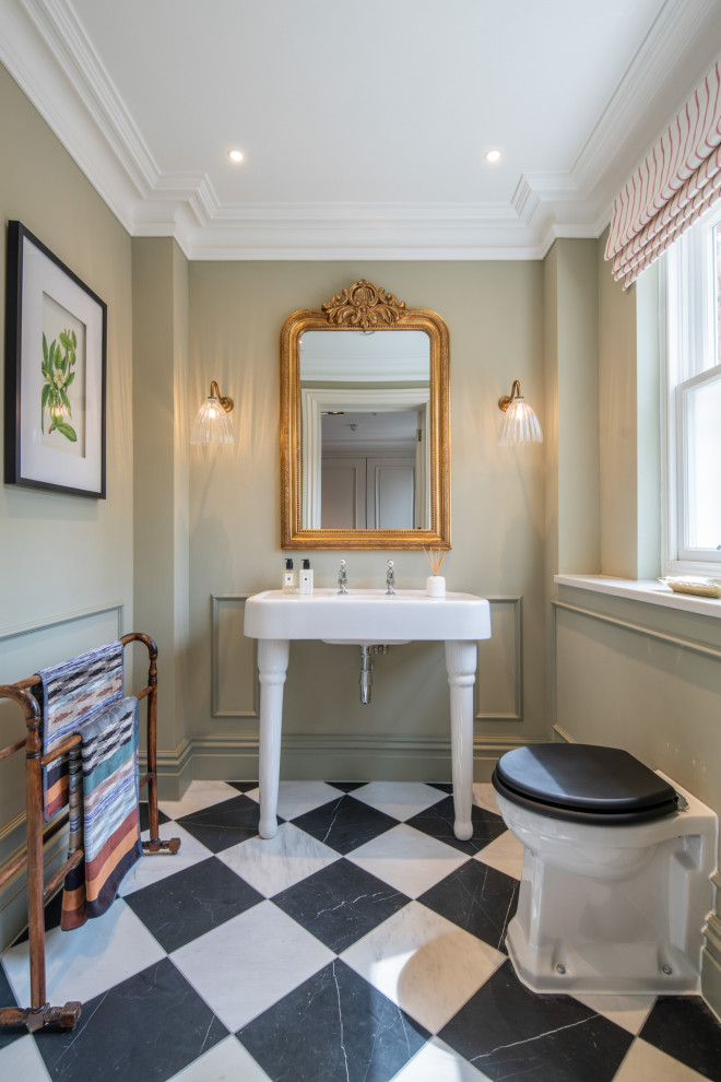 Transitional powder room in London.