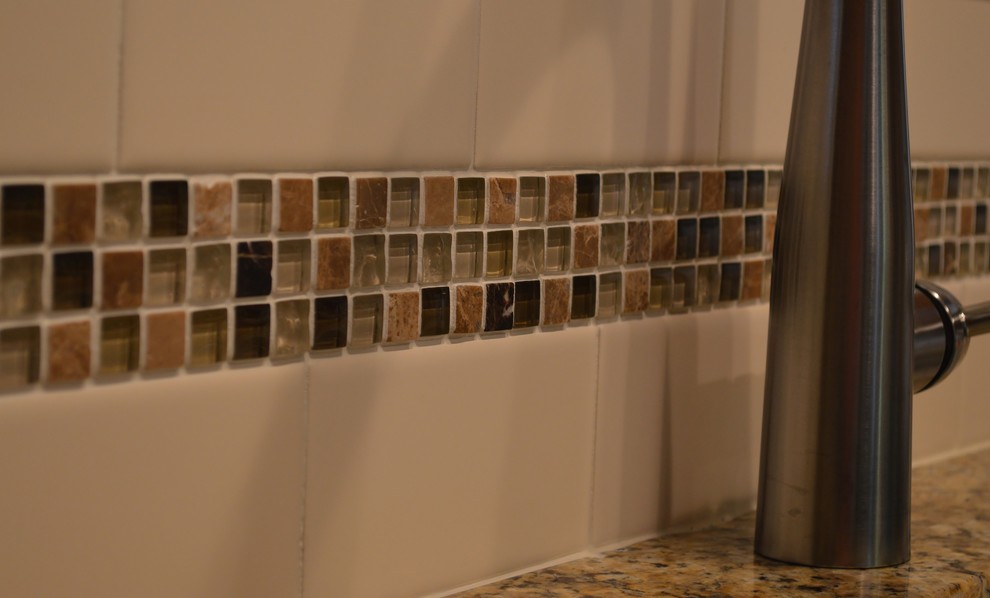 Mid-sized u-shaped kitchen photo with granite countertops