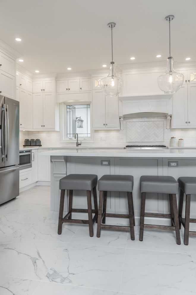 Example of a transitional kitchen design in Toronto