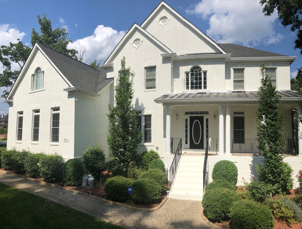 Transform Your Home Brick House Painted White with Black Shutters