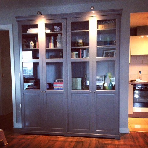 IKEA Liatorp Grey Bookcase with half glass doors.