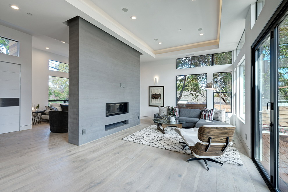 Design ideas for a large contemporary formal open concept living room in San Francisco with white walls, light hardwood floors and no tv.
