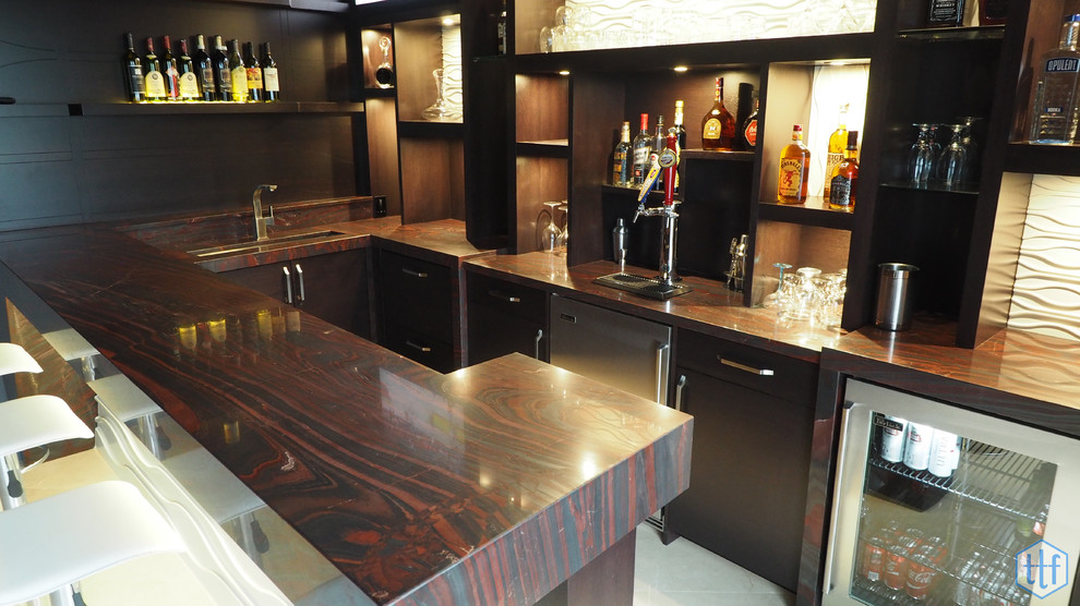 Inspiration for a mid-sized contemporary galley seated home bar in Miami with open cabinets, dark wood cabinets, wood benchtops, multi-coloured splashback, stone slab splashback and ceramic floors.