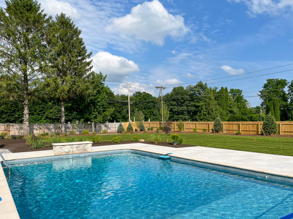 Inspiration for a back rectangular lengths swimming pool in New York with with pool landscaping.