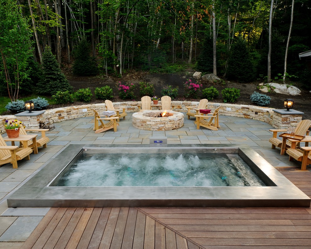 Mountain style hot tub photo in Denver