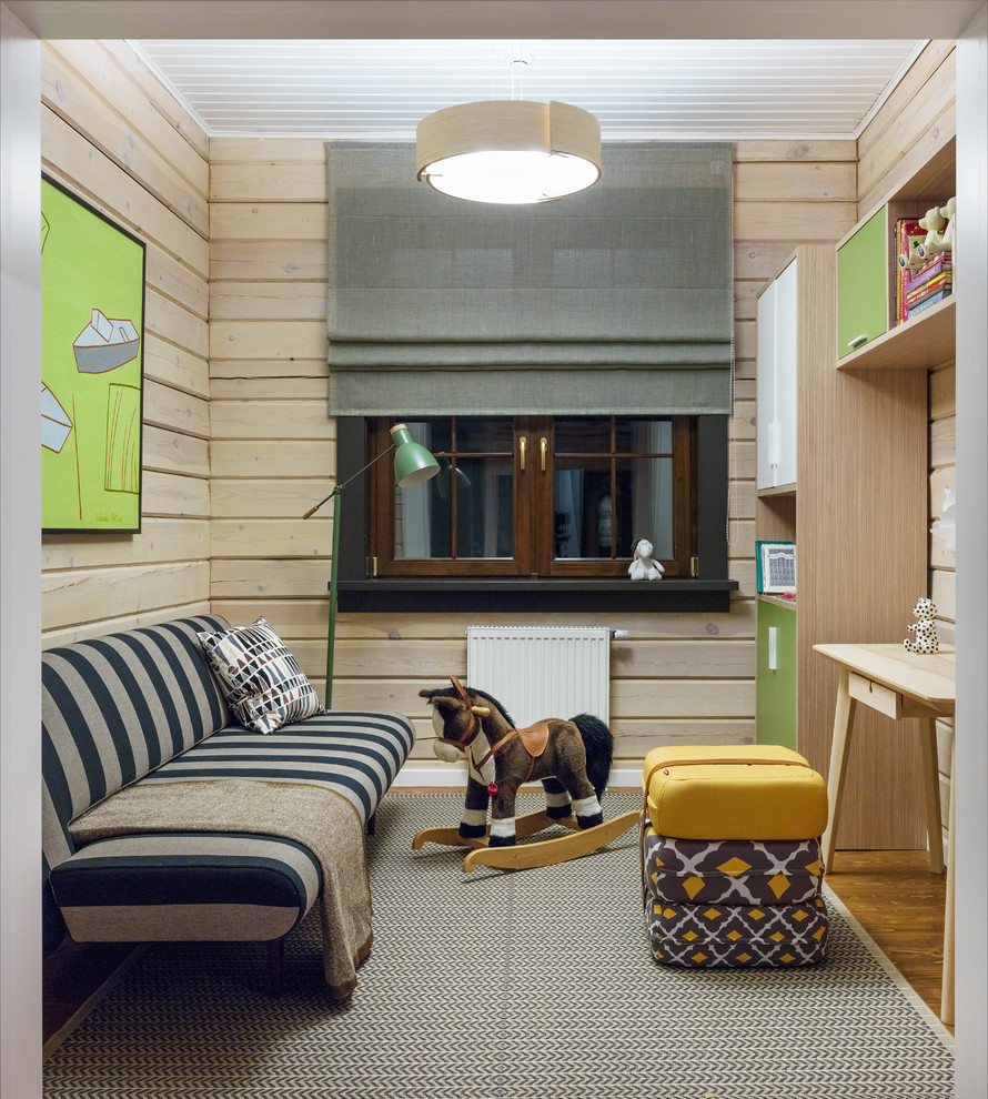 Inspiration for a mid-sized country kids' playroom for kids 4-10 years old and boys in Moscow with beige walls, medium hardwood floors and brown floor.