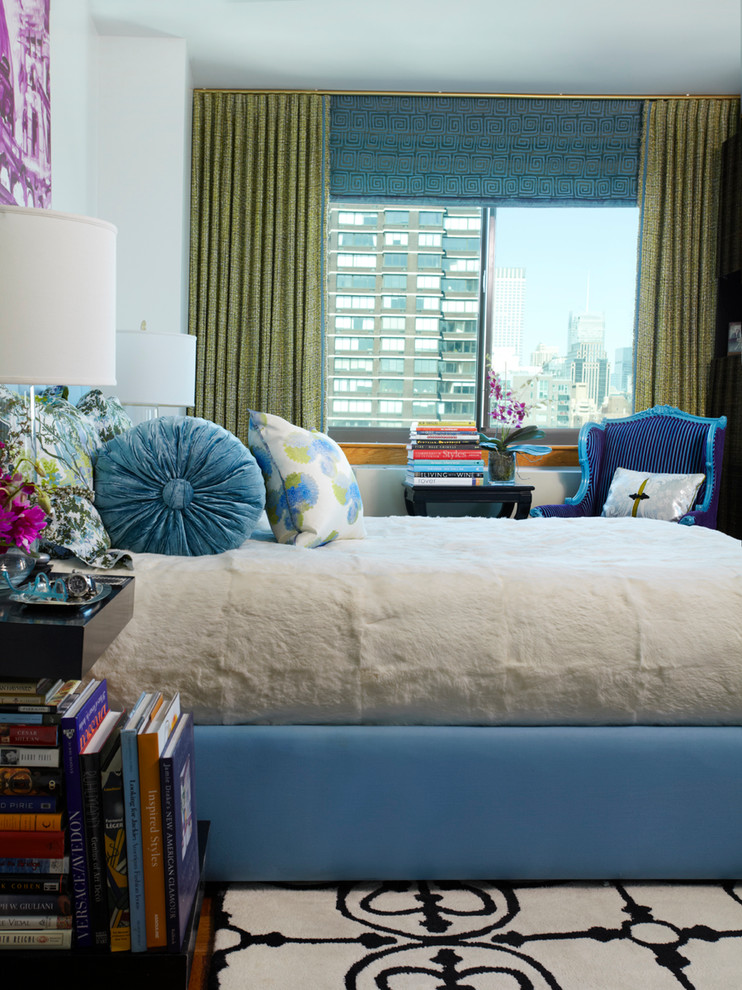 Design ideas for an eclectic bedroom in New York with blue walls.