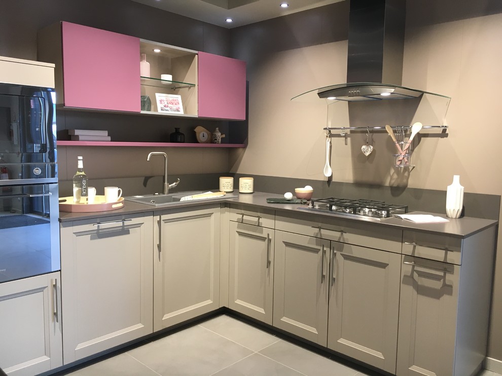 Design ideas for a small contemporary l-shaped separate kitchen in Grenoble with a single-bowl sink, beaded inset cabinets, stainless steel cabinets, laminate benchtops, grey splashback, timber splashback, stainless steel appliances, cement tiles and grey floor.