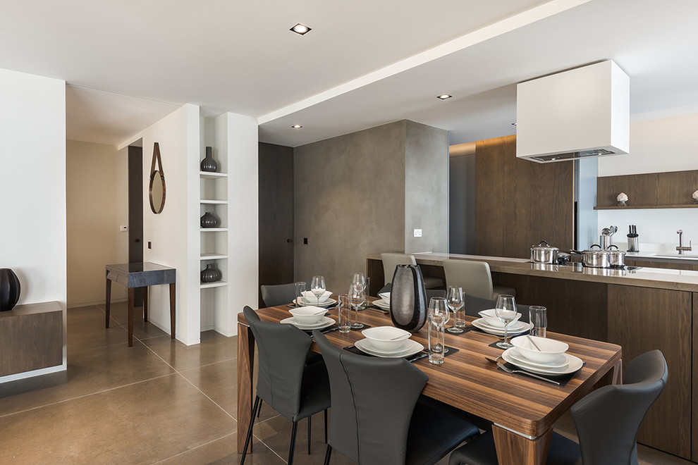 Design ideas for a contemporary open plan dining in London with grey walls.