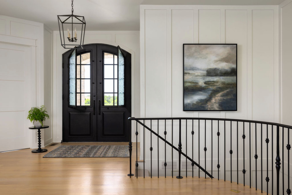 Inspiration for a transitional entryway remodel in Kansas City