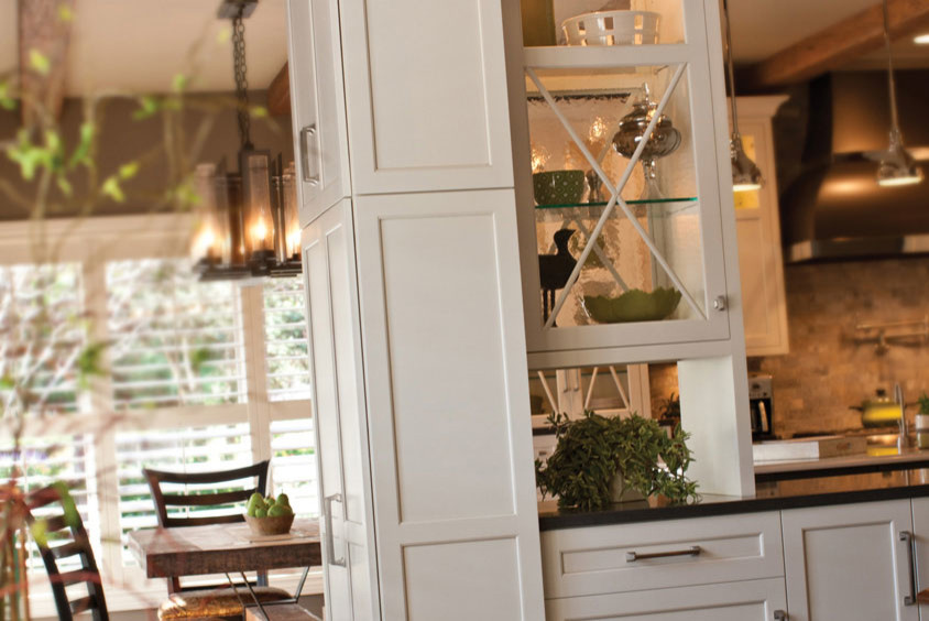 Inspiration for a large transitional l-shaped medium tone wood floor and beige floor open concept kitchen remodel in Orange County with an undermount sink, shaker cabinets, white cabinets, quartz countertops, gray backsplash, subway tile backsplash, stainless steel appliances and an island
