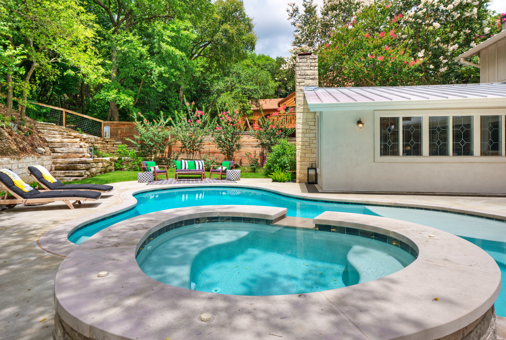 Large backyard concrete paver full sun pool fountain photo for spring in Austin