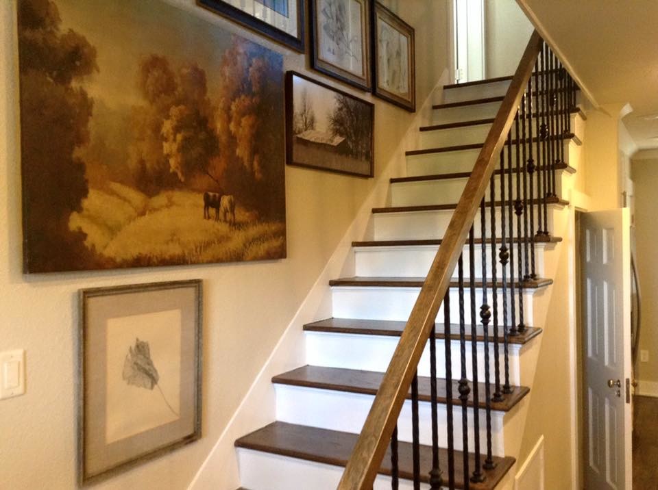Photo of a mid-sized modern wood straight staircase in Little Rock with wood risers.