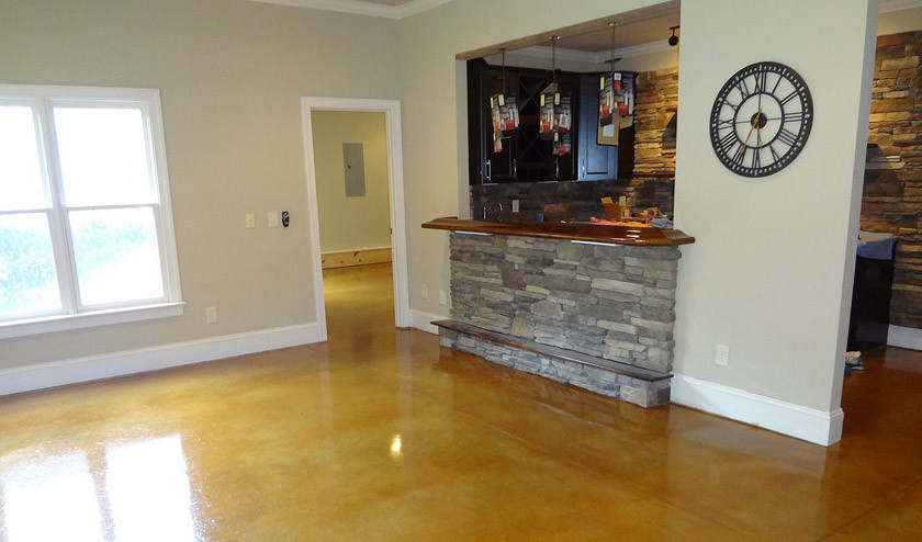 Design ideas for an arts and crafts basement in Atlanta with concrete floors.
