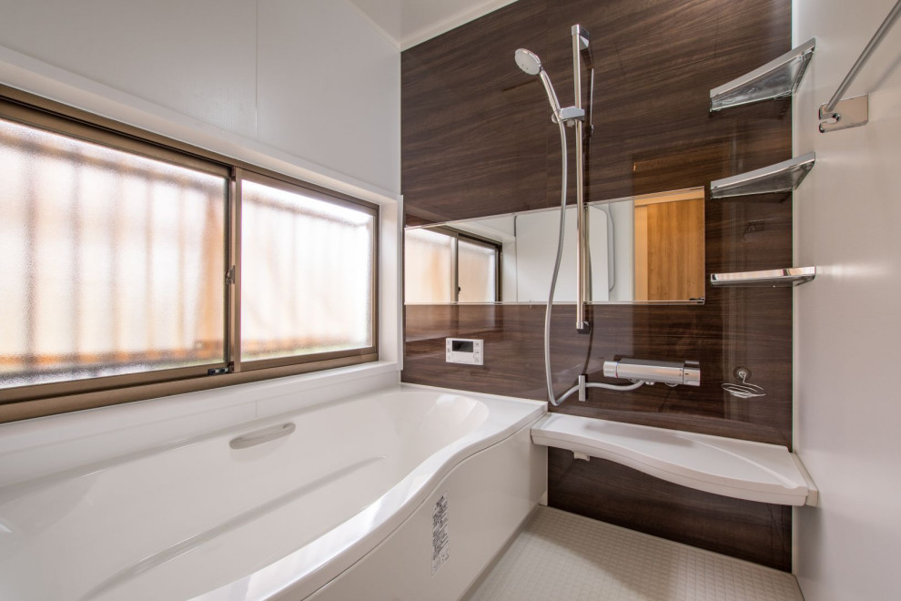 This is an example of a contemporary master wet room bathroom in Other with an alcove tub, multi-coloured walls, white floor, a hinged shower door and panelled walls.