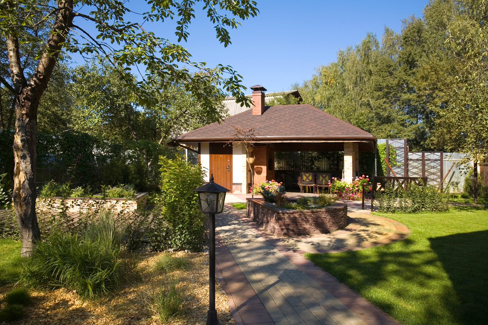 Беседка в стиле Шале на участке коттеджа