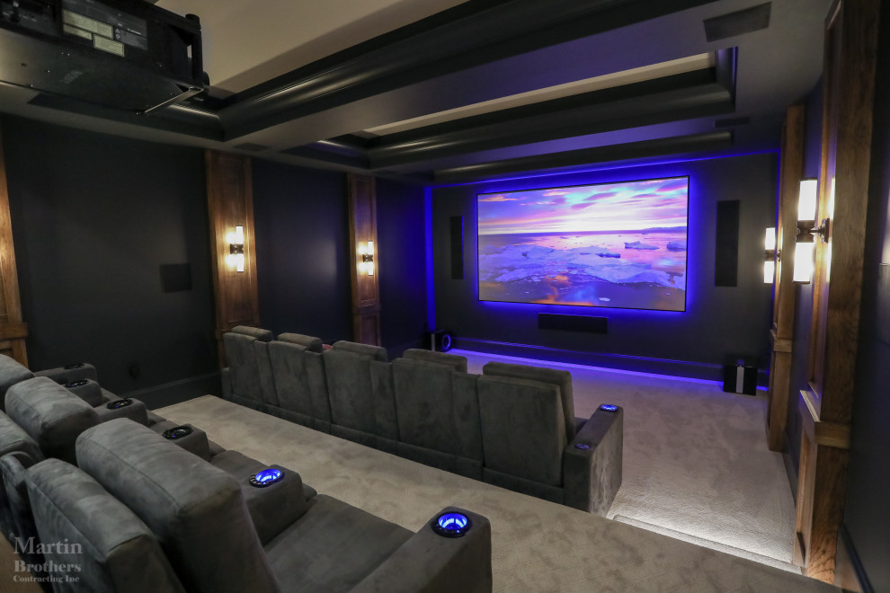 Theater Room - State of the art theater room with built-in sound system by Pro It Solutions. Cabinetry and bar by Hoosier House Furnishings, LLC. Seating for 10, plus seating at the dry bar. Solid, Hickory bar top with Hesse finish. Custom, painted Maple cabinets.

General contracting by Martin Bros. Contracting, Inc.; Architecture by Helman Sechrist Architecture; Home Design by Maple & White Design; Photography by Marie Kinney Photography.