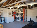 Eclectic Shed by The Design Den Homes Inc.