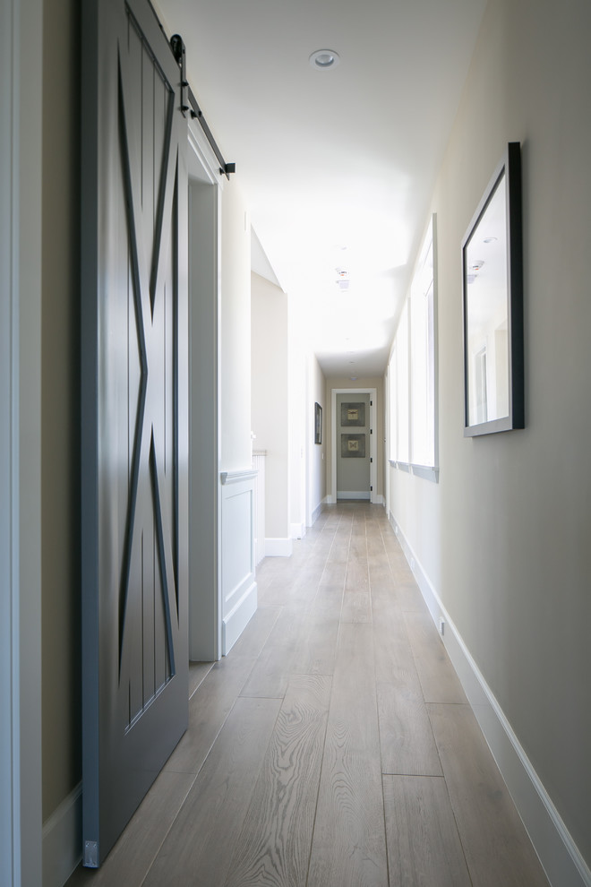 Example of a transitional hallway design in Orange County