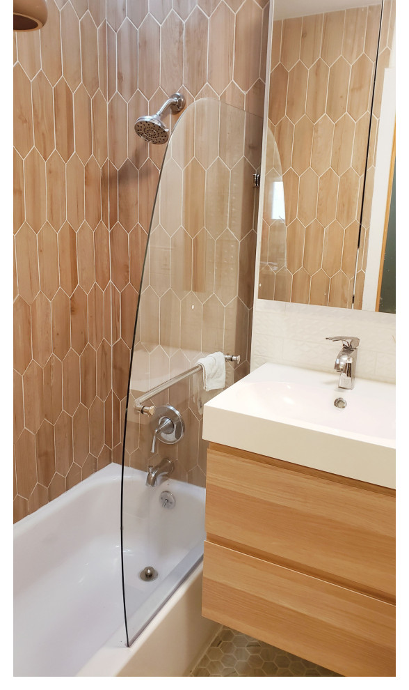 Inspiration for a small contemporary master bathroom in Philadelphia with shaker cabinets, light wood cabinets, an alcove tub, an alcove shower, orange tile, ceramic tile, mosaic tile floors, a drop-in sink, engineered quartz benchtops, multi-coloured floor, a hinged shower door and white benchtops.