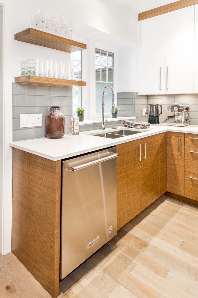 Example of a transitional kitchen design in Vancouver