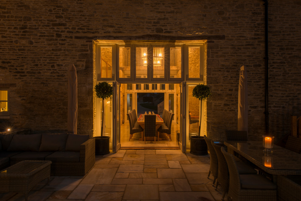 Inspiration for a traditional entrance in Gloucestershire with a double front door and a light wood front door.