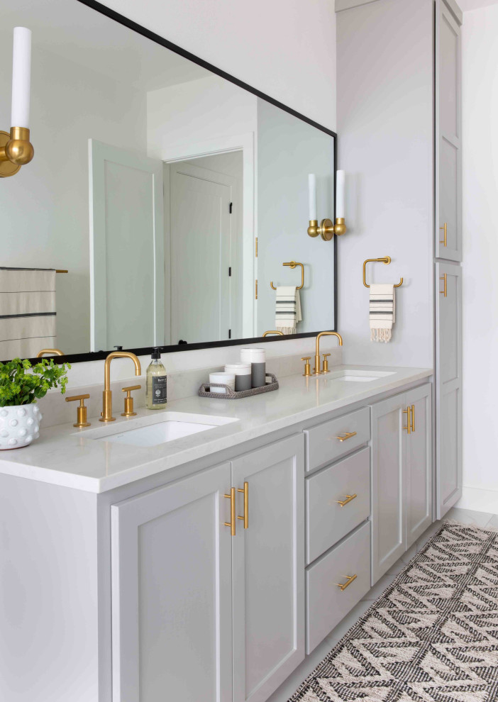 Bathroom - mid-sized cottage 3/4 gray floor bathroom idea in Austin with shaker cabinets, gray cabinets, white walls, an undermount sink and white countertops
