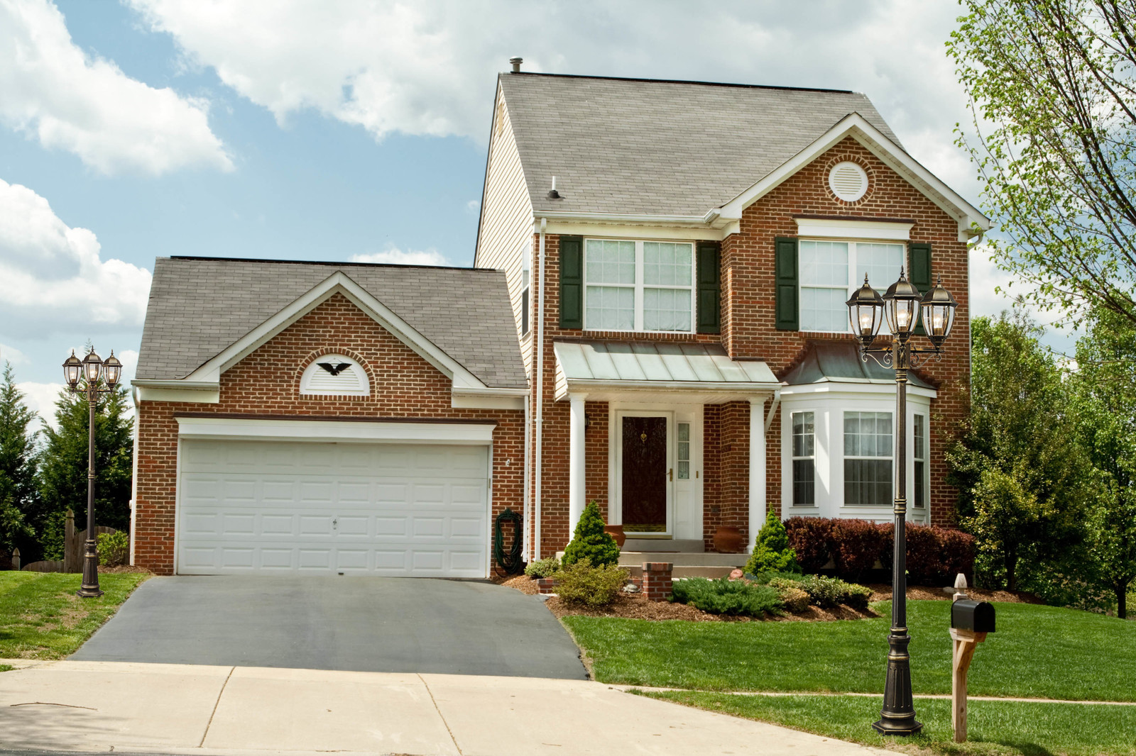 Экстерьер частного дома из красного кирпича