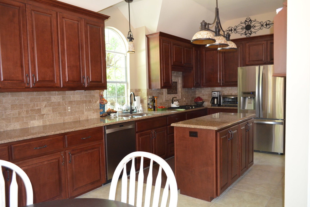 This is an example of a large transitional kitchen in Dallas.