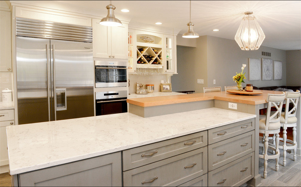 Example of a transitional kitchen design in New York