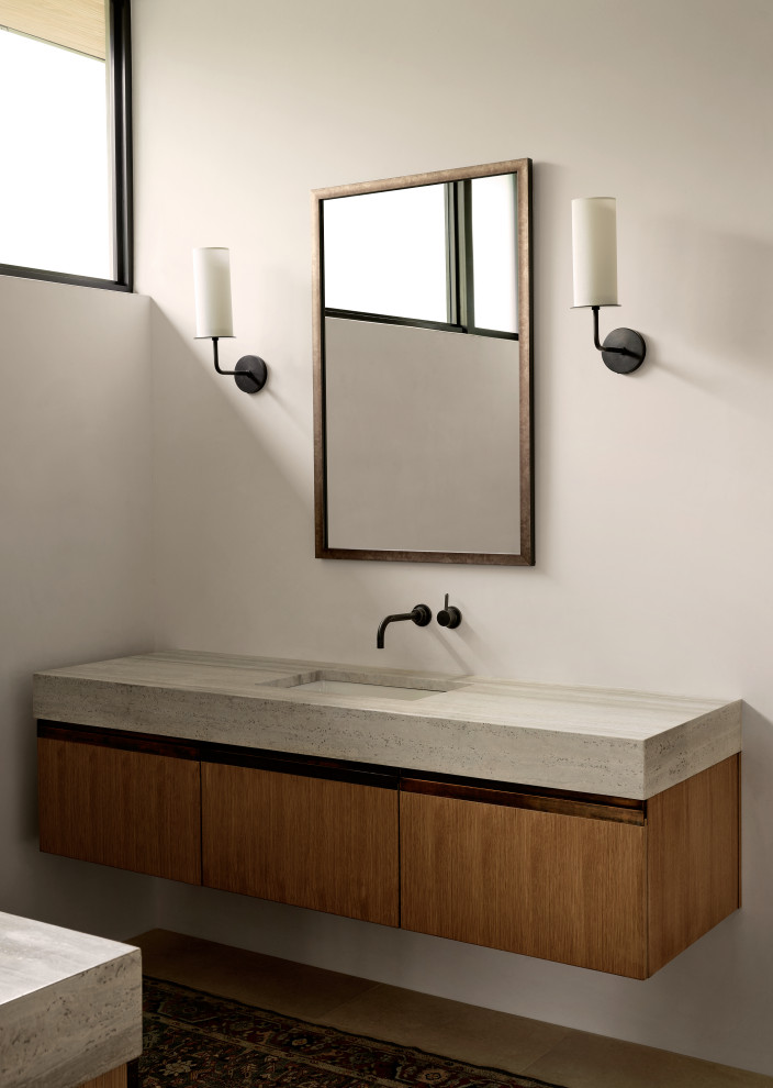 Photo of a medium sized modern ensuite bathroom in Austin with flat-panel cabinets, white walls, ceramic flooring, a submerged sink, granite worktops, grey worktops, a single sink and a floating vanity unit.