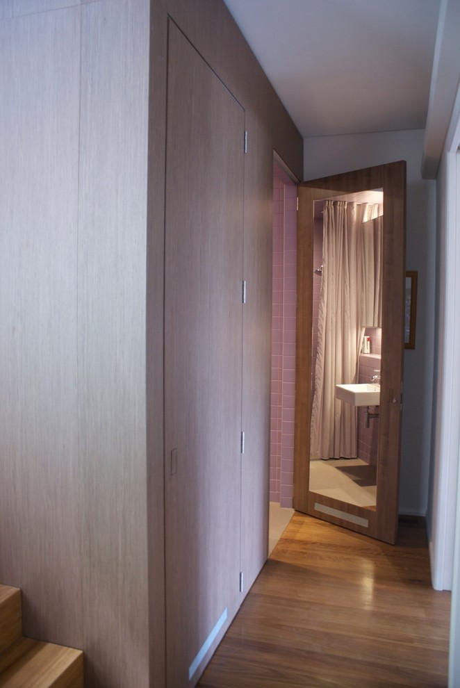 Photo of a mid-sized contemporary kids bathroom in Sydney with a wall-mount sink, tile benchtops, an open shower, ceramic tile, purple walls and porcelain floors.