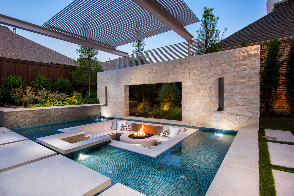 Inspiration for an expansive contemporary rectangular pool in Dallas.