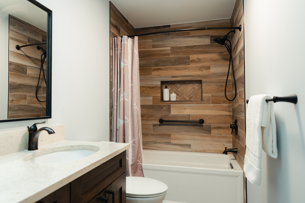 Inspiration for a medium sized rustic family bathroom in Seattle with shaker cabinets, brown cabinets, a freestanding bath, a built-in shower, porcelain flooring, an open shower, a wall niche, double sinks and a built in vanity unit.