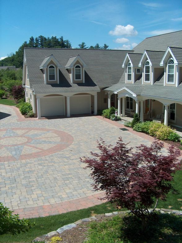 Driveway courtyard that was installed by Peter Atkins and Associates masons department.