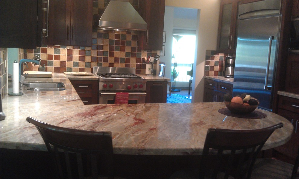 Kitchen pantry - mid-sized contemporary u-shaped terra-cotta tile and brown floor kitchen pantry idea in San Francisco with a double-bowl sink, shaker cabinets, dark wood cabinets, granite countertops, multicolored backsplash, glass tile backsplash, stainless steel appliances and a peninsula