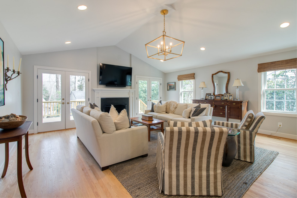 Photo of a transitional family room in Raleigh.