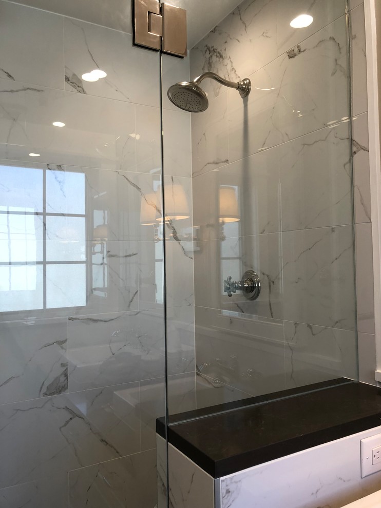 Design ideas for a mid-sized contemporary master bathroom in Denver with shaker cabinets, white cabinets, a double shower, a wall-mount toilet, white tile, porcelain tile, grey walls, porcelain floors, a drop-in sink, engineered quartz benchtops, white floor and a hinged shower door.