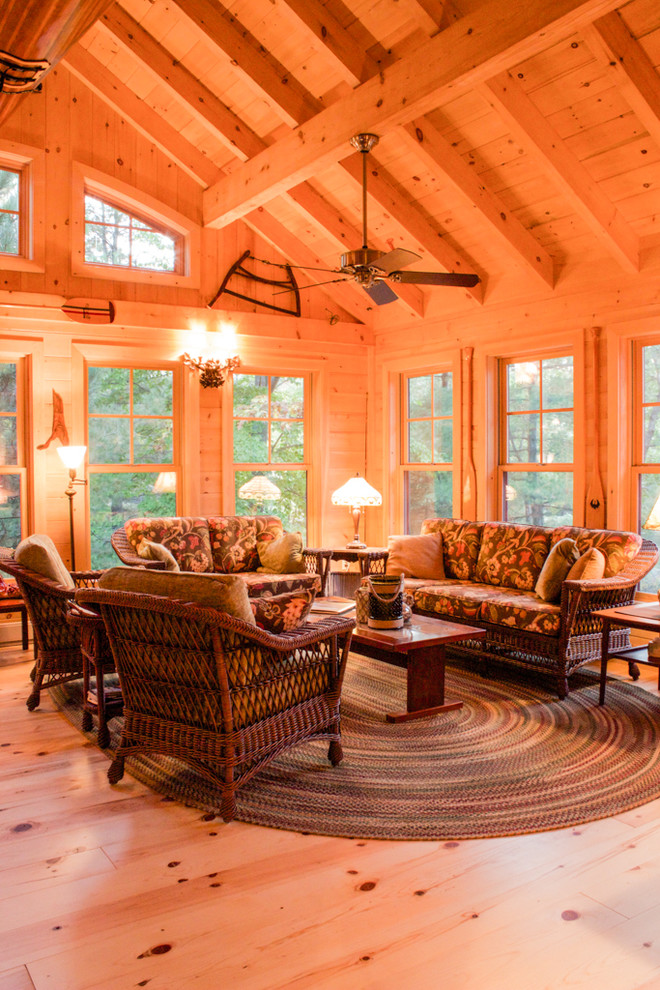 Inspiration for a large country sunroom in Other with light hardwood floors.